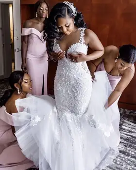 Balta nėriniuota vestuvinė suknelė Undinėlė plius dydis Gėlių aplikacijos Spagečių dirželiai Be rankovių 2020 m. Nauji Afrikos nuotakos chalatai